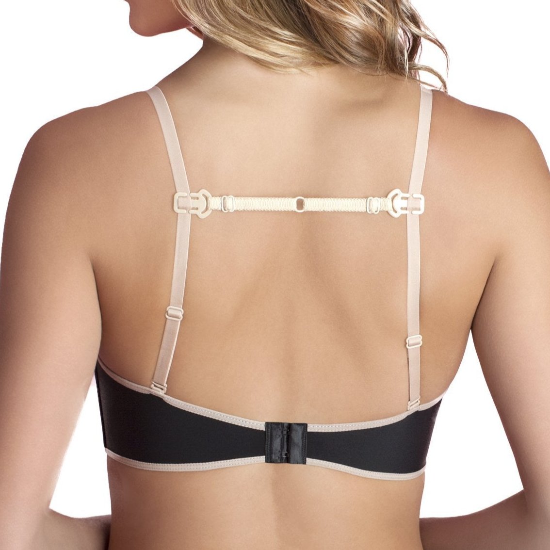 Model wearing the strap mate on her bra, view is from the backside. It's holding her bra straps together, showing it can keep your bra straps in place. Strap is beige.